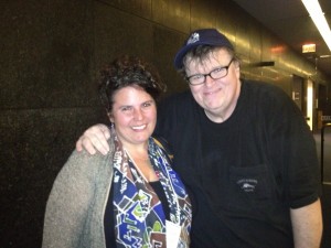 Tamara with Michael Moore in Lansing, Michigan, April 2013