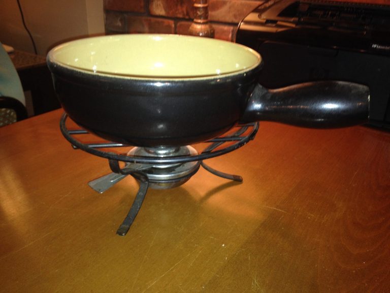 Vintage Glazed Ceramic Fondue Pot:  255,700 ppm Lead on the interior glaze!!!! Vintage Fondue pots should never be used for food use purposes.