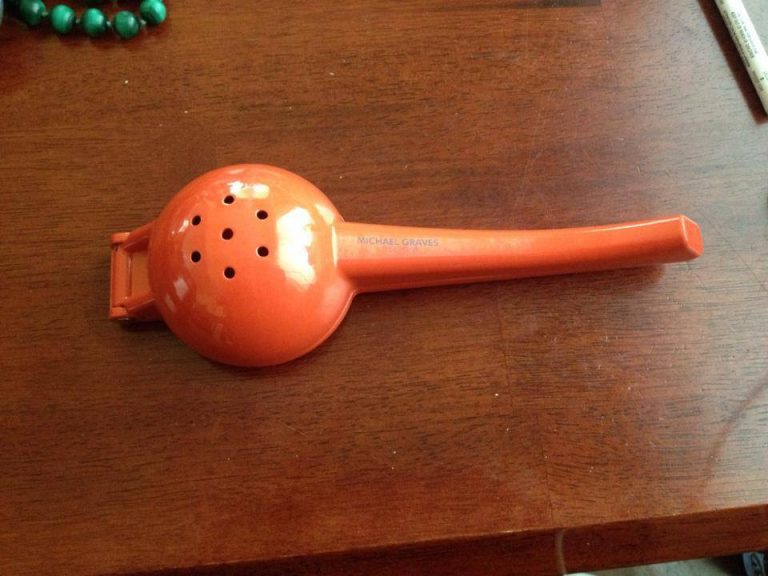 Newer (c. 2014) Orange Painted Michael Graves Hand Citrus Juicer: 429 ppm Lead