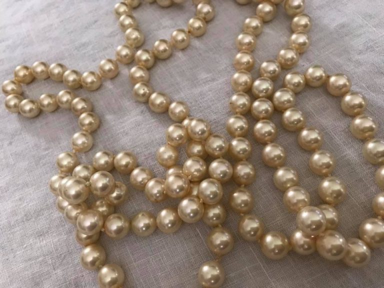 Maybe Grandma can Keep her Vintage Faux Pearls?: 295,900 ppm Lead (90 & up is unsafe in items kids use)