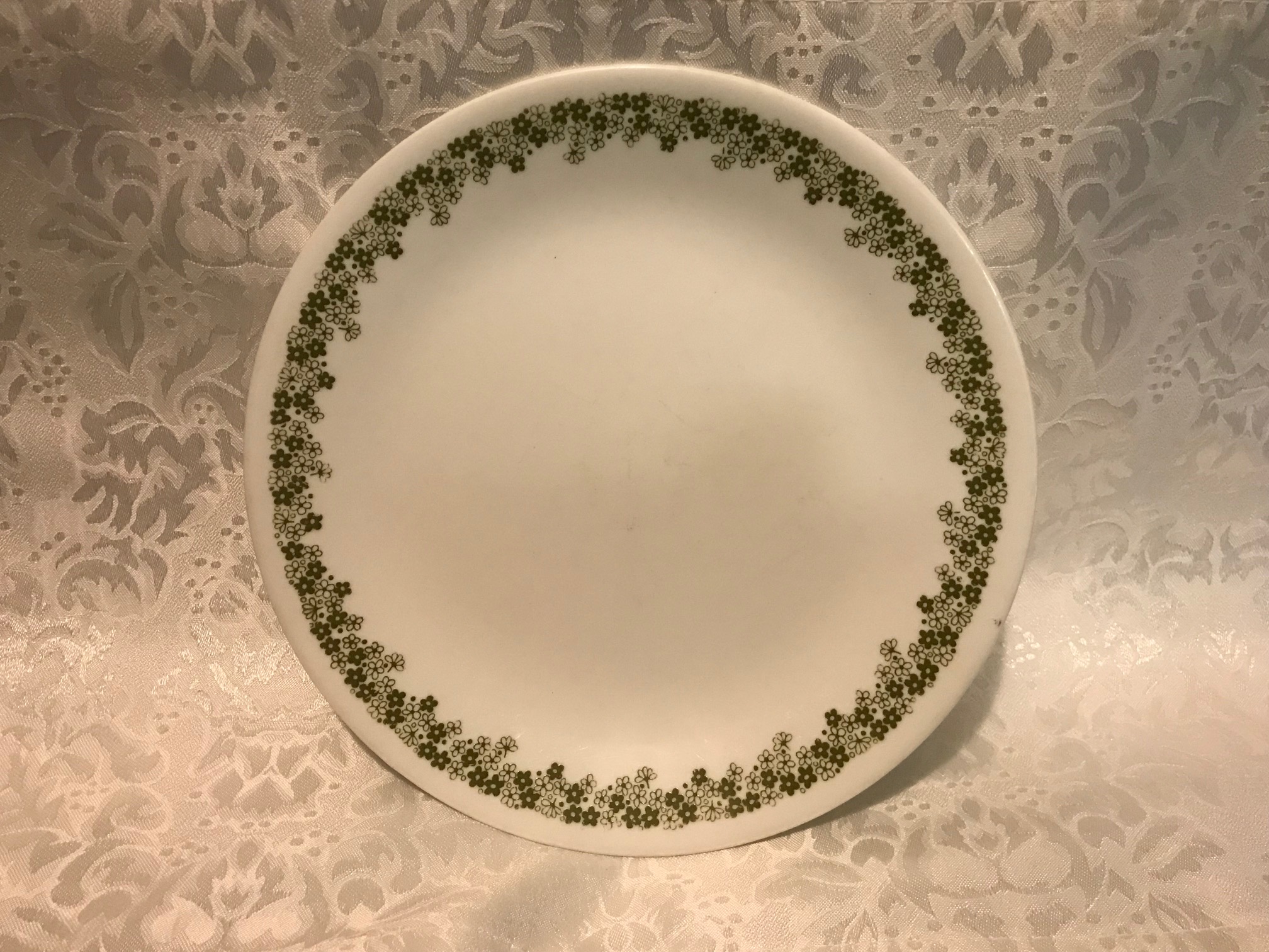 Corelle Plate With Crazy Daisy Spring Blossom Green Border Pattern: 15,200 ppm Lead + Cadmium