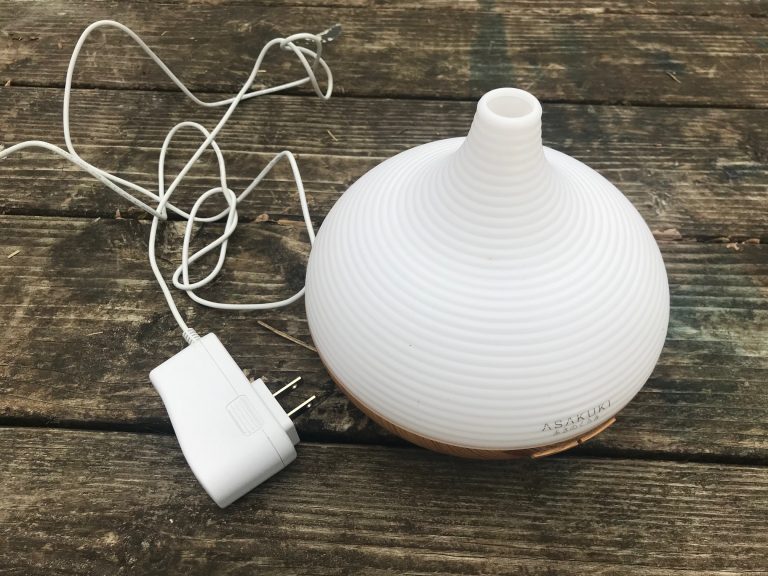 Asakuki White Plastic and Wood Design Essential Oil Diffuser:  9,398 ppm Lead in center of inside of unit.