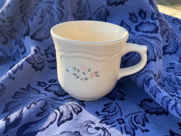 Unmarked, unbranded ceramic cup with floral pattern. 33,500 ppm Lead on the pink tulip of the design. 90 ppm is unsafe.