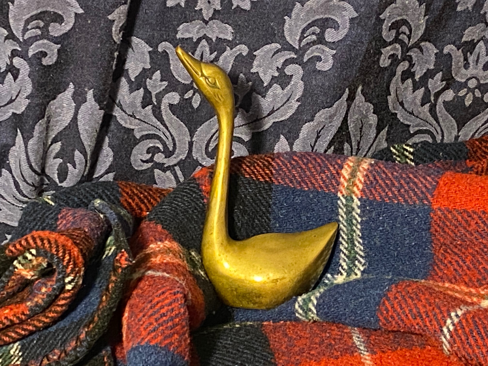 Brass swan figurine, made in Korea: 23,500 ppm Lead (90 ppm is unsafe for  kids) + 388 ppm Antimony.