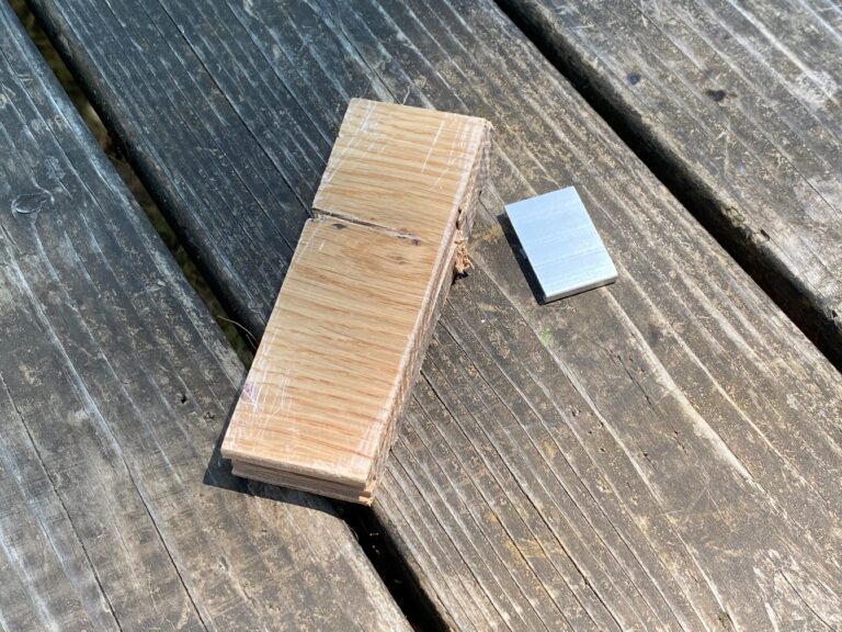 Finished wood sample and metal clip: File this under “random building supplies my readers send me to test”