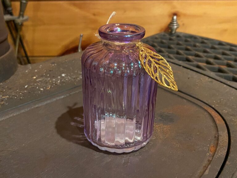 Dollar Store purple “carnival glass” bottle with golden leaf ornament: positive for trace Lead, Cadmium & Antimony (at relatively safe levels.)