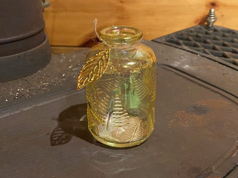 Dollar Store yellow “carnival glass” bottle with golden leaf ornament: positive for trace Cadmium & Antimony (at relatively safe levels.)