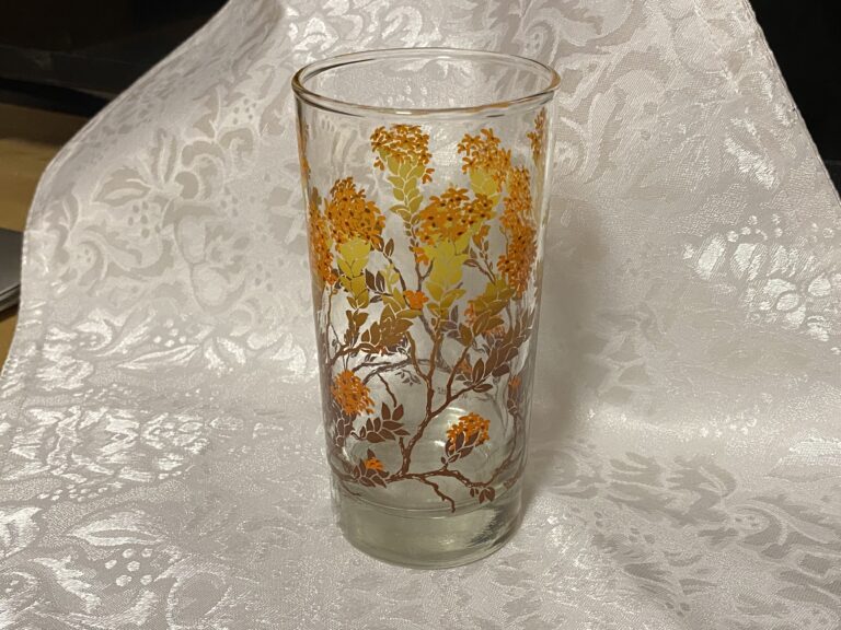 Vintage Libbey glass with orange, brown & yellow floral pattern: 87,100 ppm Lead + 3,541 ppm Cadmium in the painted decorations.