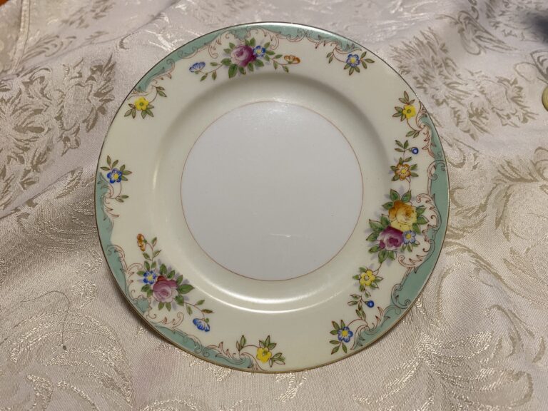 Hand painted vintage Made In Japan floral saucer with roses: 12,300 ppm Lead on the food surface of the dish.