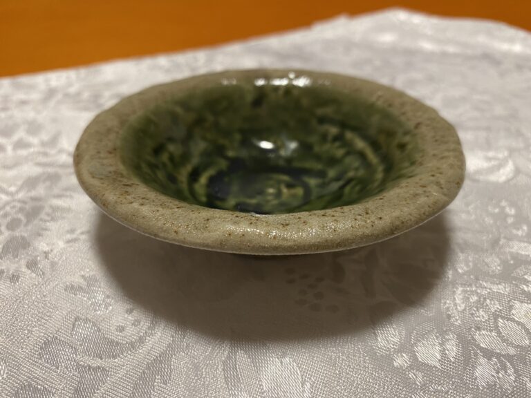 Small handmade green glazed ceramic dish: 23 ppm Lead + 6 ppm Cadmium. Safe by all standards.