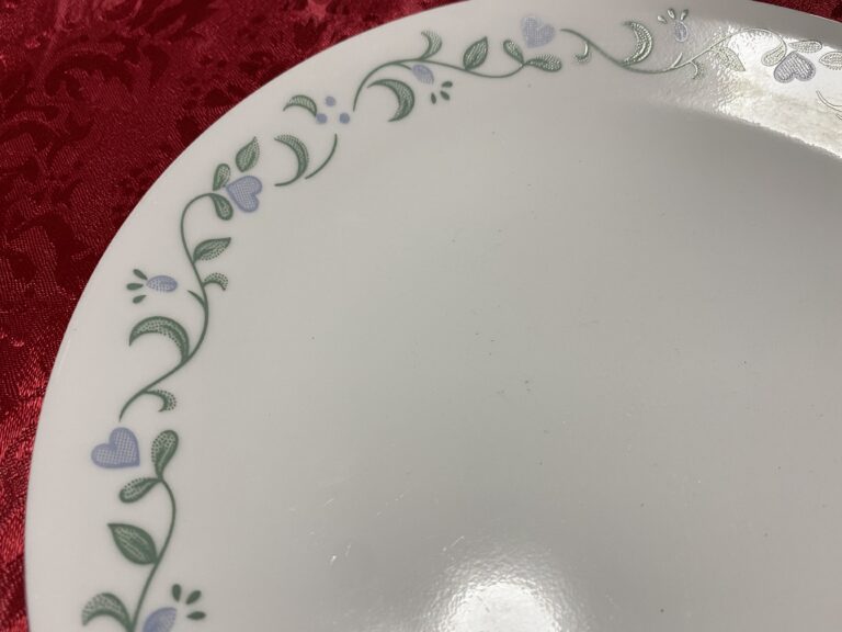 Modern (post 2005?) Corelle dish with blue heart-shaped flowers, green leaves and vines: Positive for trace levels of Lead and Cadmium (safe by all standards)