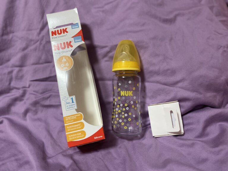 Yellow flower pattern glass Nuk baby bottle purchased on Amazon, 2021: 20,300 ppm Lead in the paint – 90 ppm Lead (& up ) is unsafe for kids