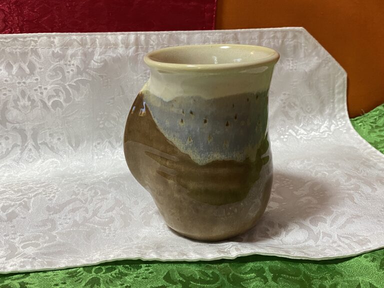 Handmade ceramic mug with white, blue & brown glaze: 39 ppm Lead in the substrate & 23 ppm on the food surface (safe by all standards).