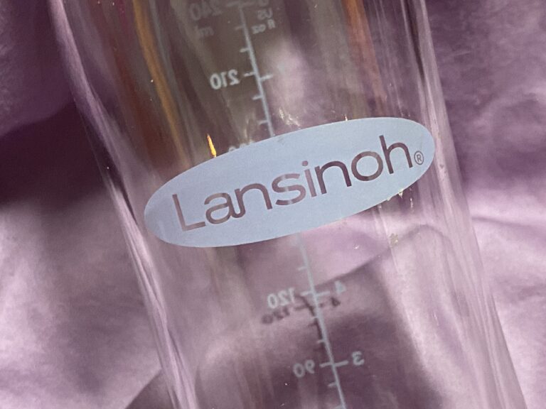 Painted logo and markings on Lansinoh mOmma glass bottles contain high Lead paint (at levels considered unsafe for children)