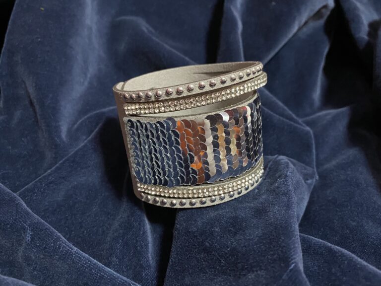 Paparazzi silver sequin cuff bracelet (with possible leather backing): Non-detect for Lead, Cadmium, Mercury, & Arsenic — positive for trace Antimony