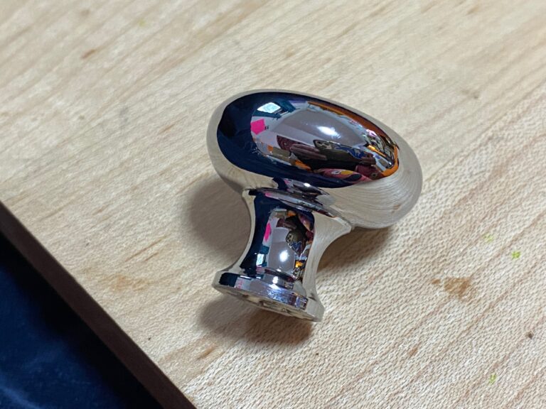 Sliver / Chrome colored cabinet knob / drawer pull: 36 ppm Lead (safe by all standards), 80 ppm Mercury (no specified total content limits for hazard determination.)