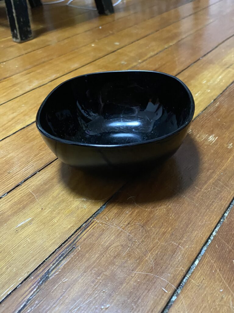 Black glass bowl:  24 ppm Lead & 11 ppm Cadmium. Safe by all standards.