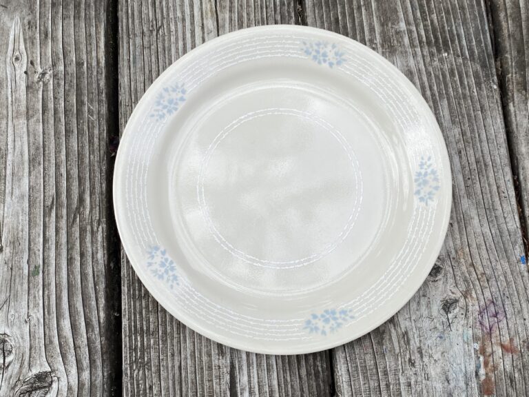 Cream colored colored Corelle with white and blue floral pattern: 16,300 ppm Lead on the food surface of the dish.