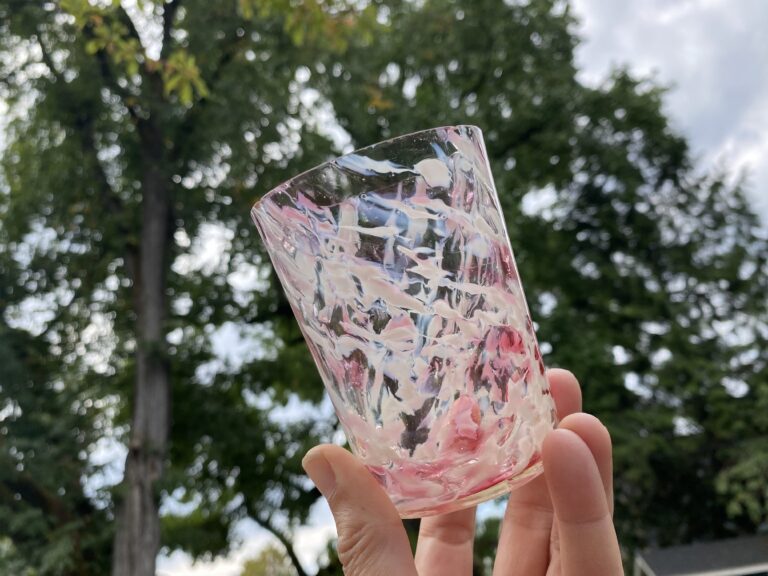 Antique juice glass (red & white swirl design), positive for concerning levels of Lead, Mercury and Antimony when tested with an XRF instrument.